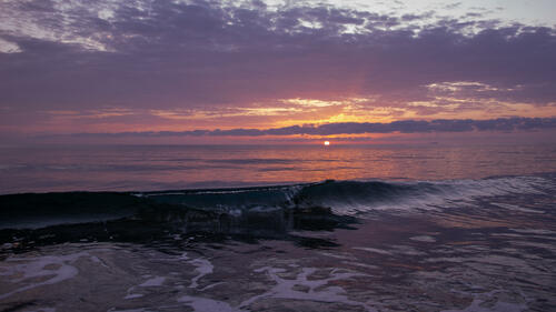 Wavy Sunrise over the sea